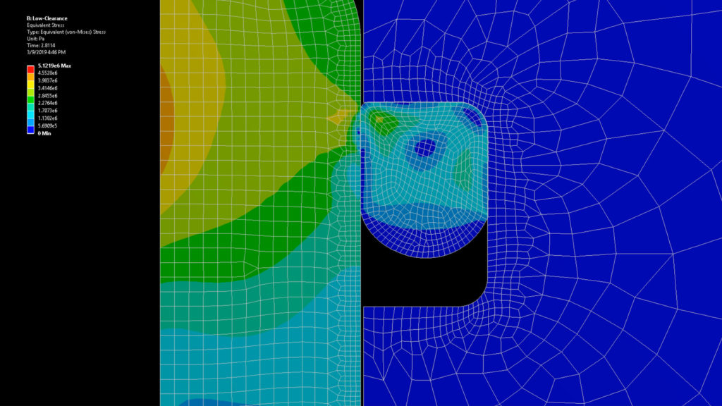 FEA image showing piston o-ring deformed in the gland due to pressure.